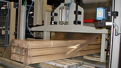 Системы упаковки штабелей WEINIG